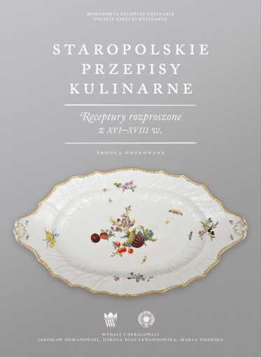 Szara okładka książki z porcelanowym białym półmiskiem ozdobionym kwiatami, owocami i owadami.